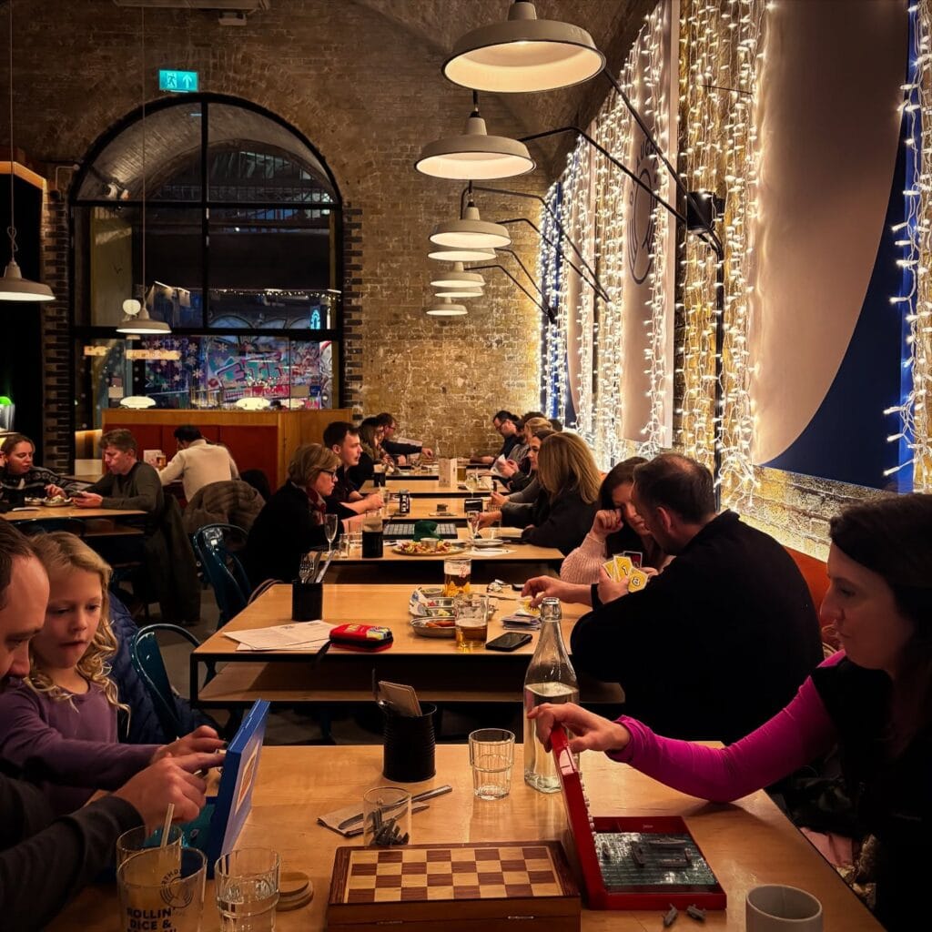 Draughts Waterloo people playing games, fairy lights